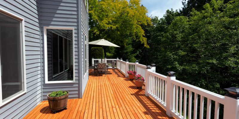 New red cedar outdoor wooden deck during nice weather in horizontal layout